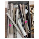 Metal box with mixed metal parts and incomplete barrels