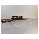 Marlin Model 15 .22 has residue from tape or sticker on the stock