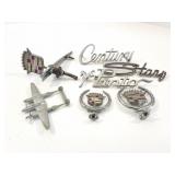 CADILLAC HOOD ORNAMENTS- AND ASSORTED BADGES