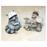 RACOON AND GIRL ON FENCE FIGURE