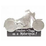 FREEDOM IS FOUND ON A MOTORCYCLE TIN SIGN