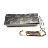 QUEEN. CUTLERY CO- 40 CSRVED STAG BONE- FOLDING