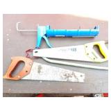 3- HAND SAWS AND A LARGE CAULK GUN