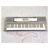 YAHMAHA EZ- 200- ELECTRIC KEYBOARD- WITH CORD