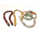 STRUNG POLISHED STONES AND BEADS
