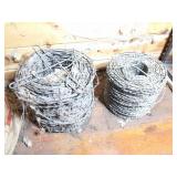 2  ROLLS OF BARBED WIRE- APPEAR CLOSE TO FULL