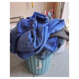 MOVING BLANKETS IN GARBAGE CAN