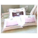 4 NEW PILLOWS-STILL IN PACKAGING