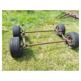 4 WHEELS- WITH TWO AXLES HOOKED TOGETHER WITH