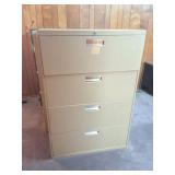 Large 4 drawer file cabinet. Buyer must move