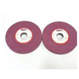 2 pink abrasive grinding wheels