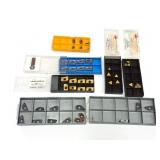 Assorted indexable carbide cutting inserts