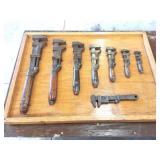 VINTAGE MONKEY WRENCH COLLECTION ON WOODEN BOARD