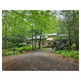 10 Acres of Woodland with a Home