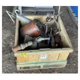 Bin of Bottle Jacks and Grease Guns