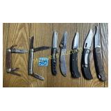 (7) VARIOUS USED POCKET KNIVES