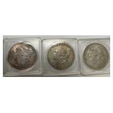(3) Morgan Silver Dollars