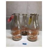 Antique Strickler glass milk bottles