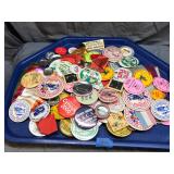 Lot of vintage advertising buttons