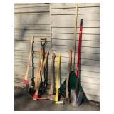 Lots of long handled outdoor tools