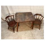 Child size table with two wooden chairs