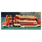 Pair of large toy fire trucks