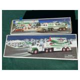 Pair of vintage Hess trucks