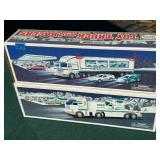 Pair of vintage Hess trucks