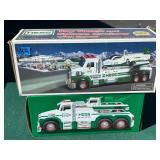 Pair of toy HESS trucks