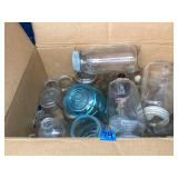 Lots of antique bottles and mason jars