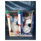 Pair of dancing snowman figures