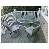 Glass top outdoor table w/ four chairs