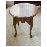 Three wooden end tables