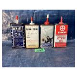 4 small vintage oil cans