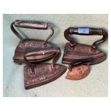 4 antique irons & 1 rest