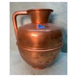 Antique hammered copper milk pitcher