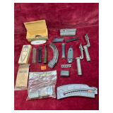 Various gun parts and magazines