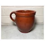 Vintage single handled redware crock/pitcher