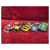 Various Die-Cast Collectible Racing Cars & Trucks