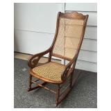 Antique Pressed Back Cane Rocking Chair