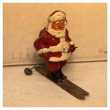 Vintage Cast Iron Skiing Santa Claus Figurine
