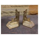 brass decorated bookends