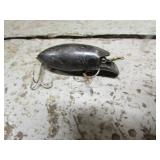 black wooden fishing lure