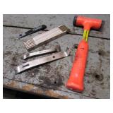 mallet,2 small prybars,tape measure & item