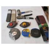 tape measures,chalk lines,sandpaper & items