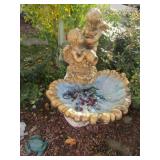 concrete cupid bird bath