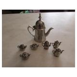 tiny metal teapots & teapot