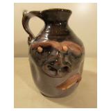 Alewine pottery folk art face jug