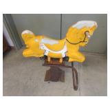 old playground plastic rocking horse