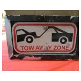 tow away zone sign